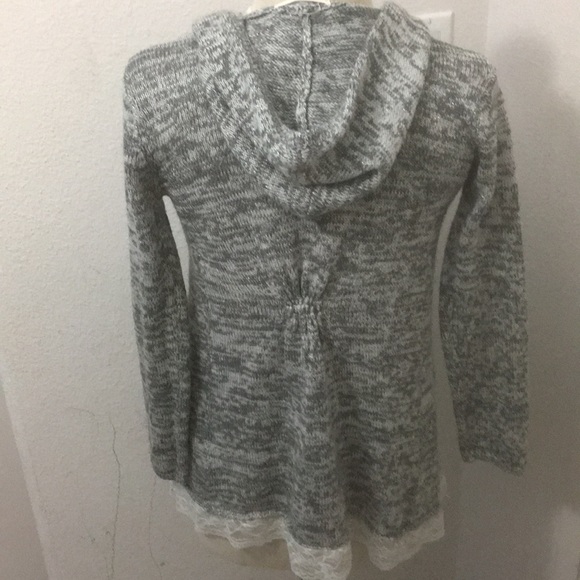 Cute sparkly gray sweater with laces on the bottom - Picture 2 of 3